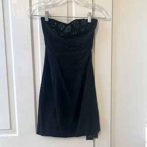 Black strapless Free People mini dress.